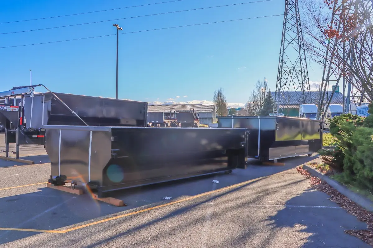 Roll-off dumpster ready for waste disposal at job site for 2 Yard Dumpster Rental in Braidwood